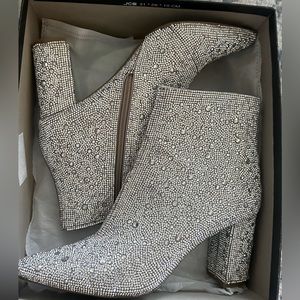 New. Never worn. Size 9.5 Betty Johnson rhinestone booties